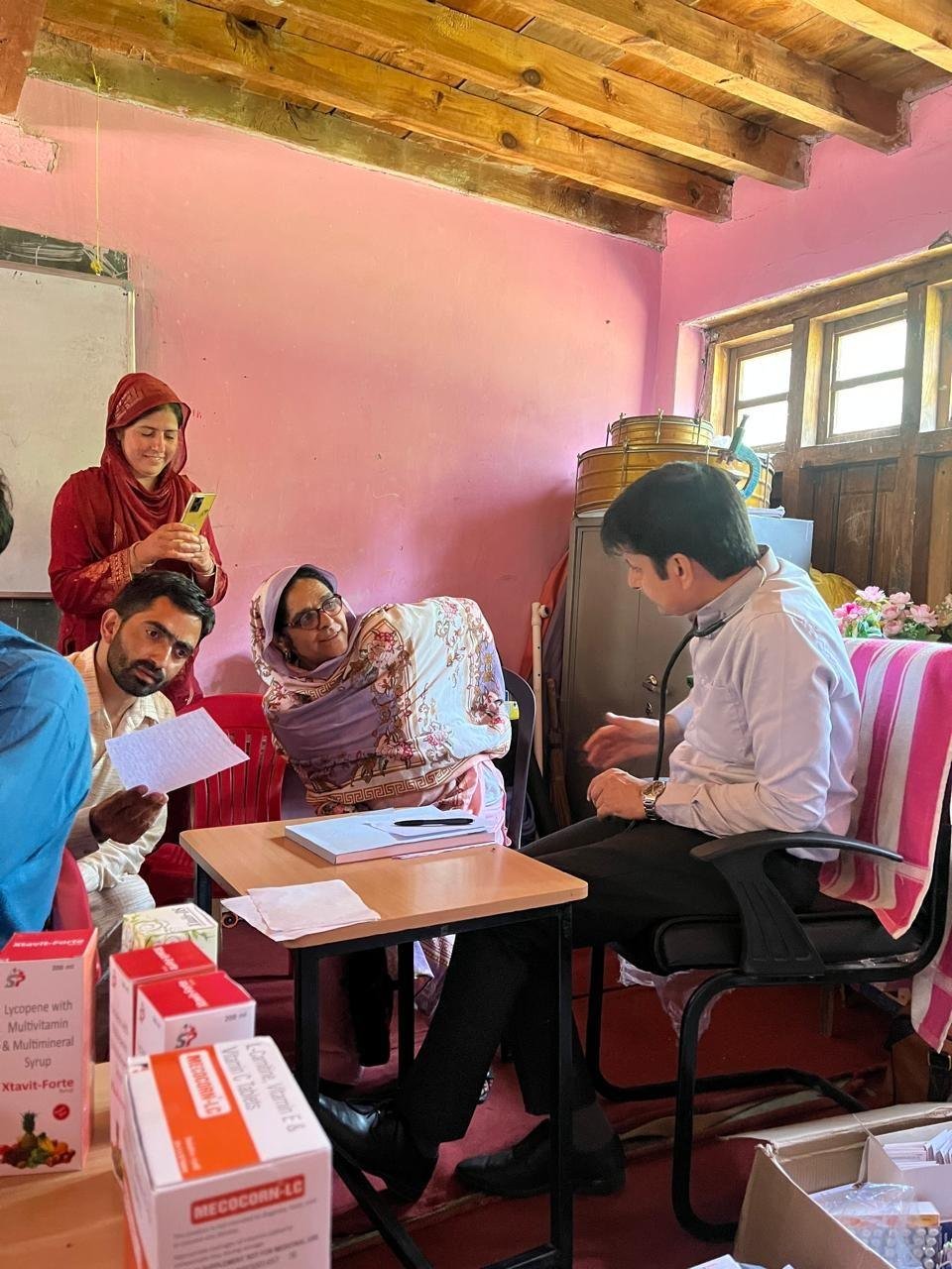 Dr. Chowdhary checking a patient